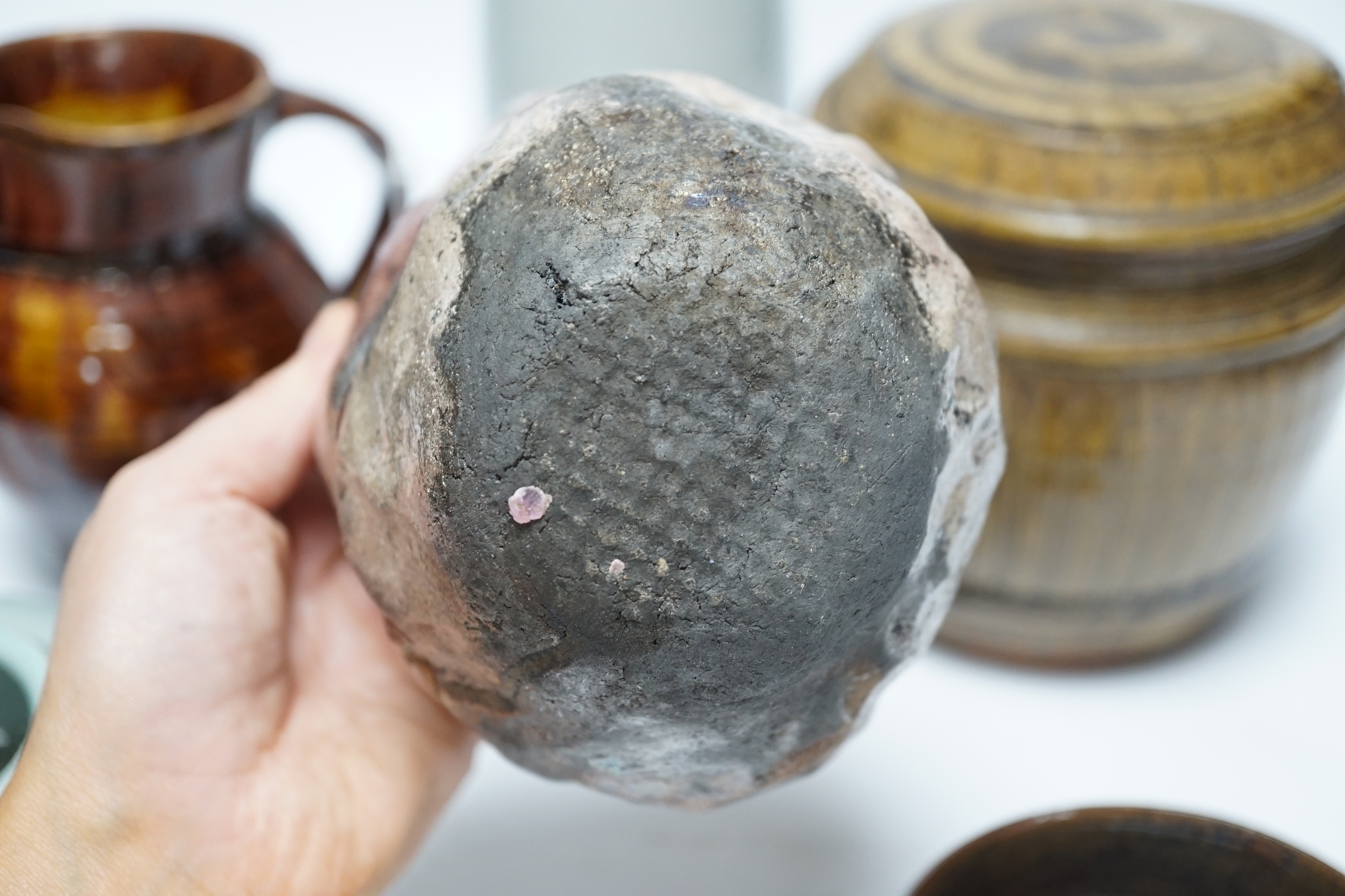 Studio ceramics to include a St. Ives moulded jug and an ash glazed jar and cover marked 'MD' etc. St Ives jug 15cm high